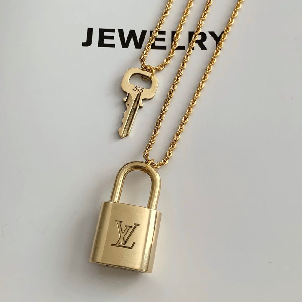 Louis Vuitton Lock Necklace - Antique Gold shops